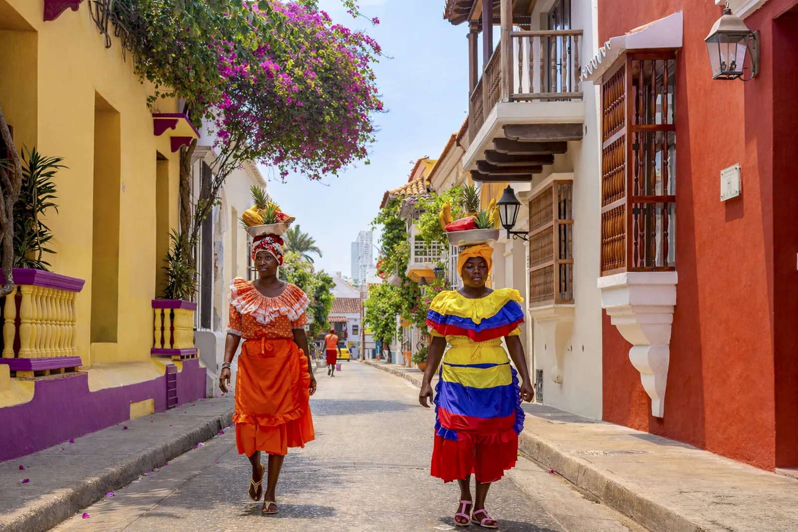 Palenqueras on a colonial street in Cartagena's Old Town