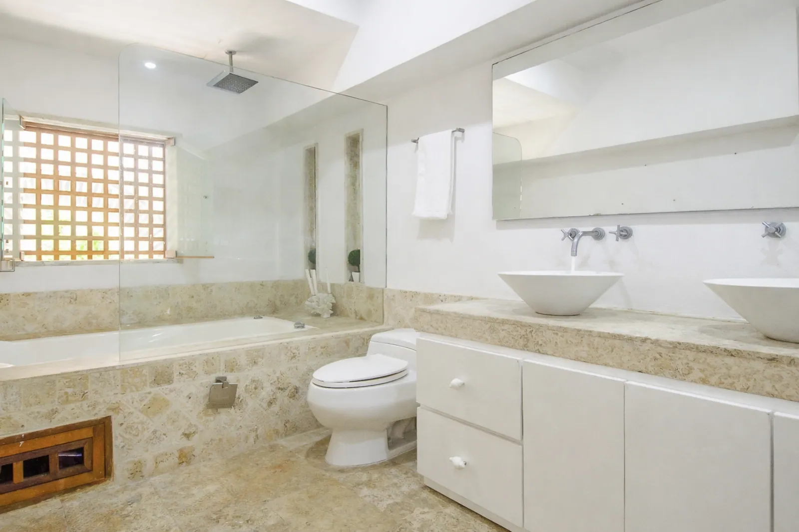 Master bathroom with bathtub and double vanity