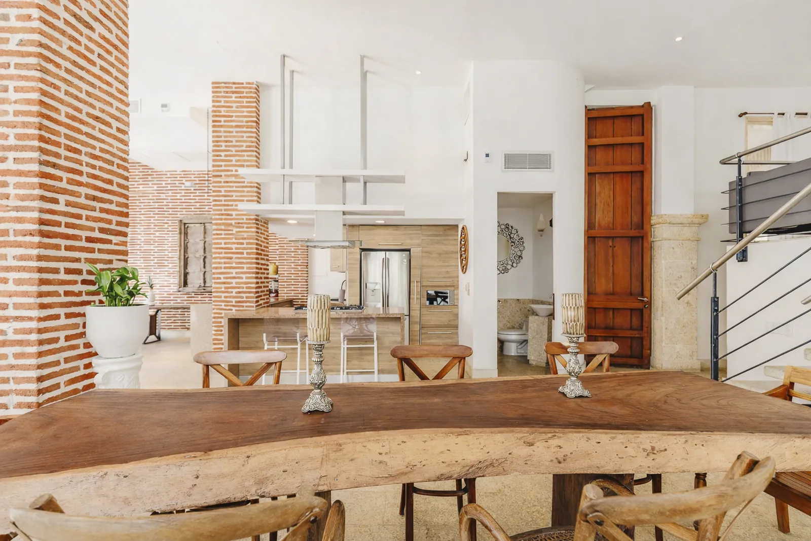 Large solid-wood dining table, colonial apartment